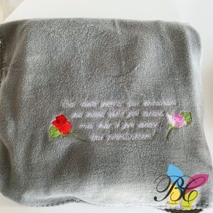 Manta bordada, 2 rosas